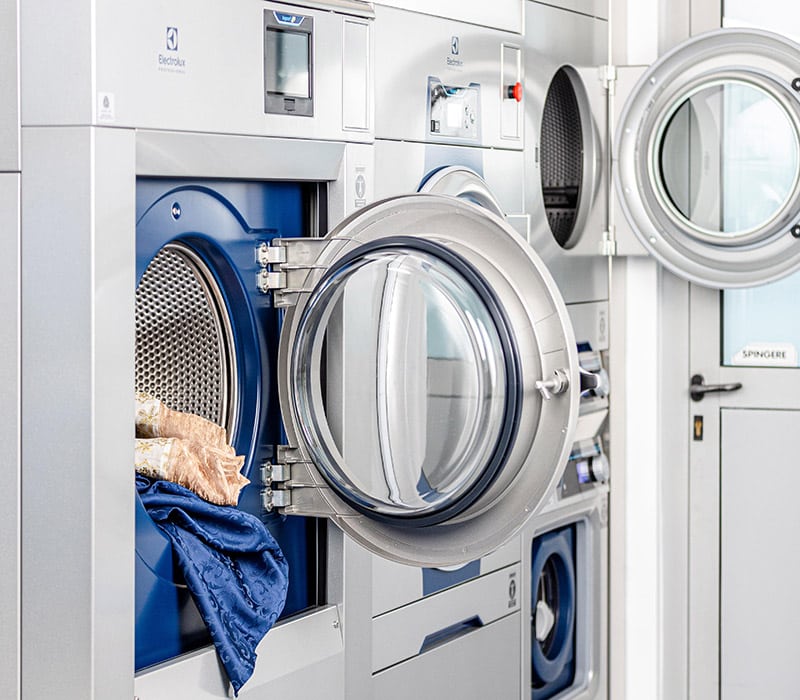 someone using a rental washing machine